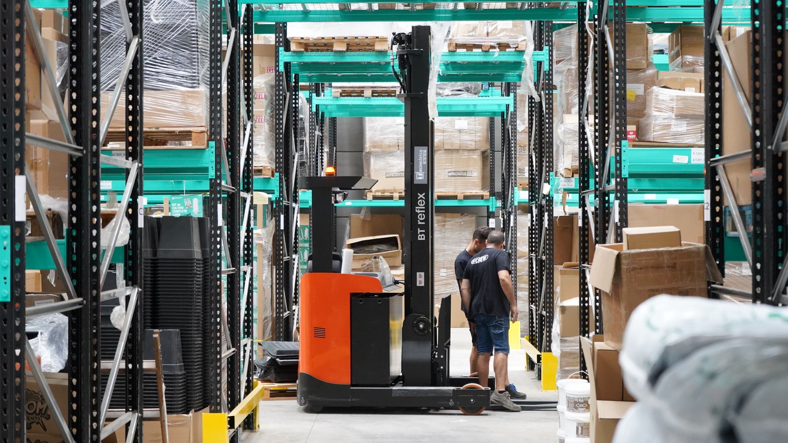 Wide view across a modern retail and eCommerce fulfilment warehouse.